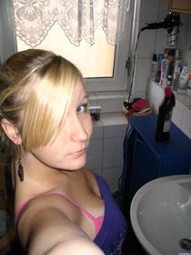Pretty blonde teen gives a